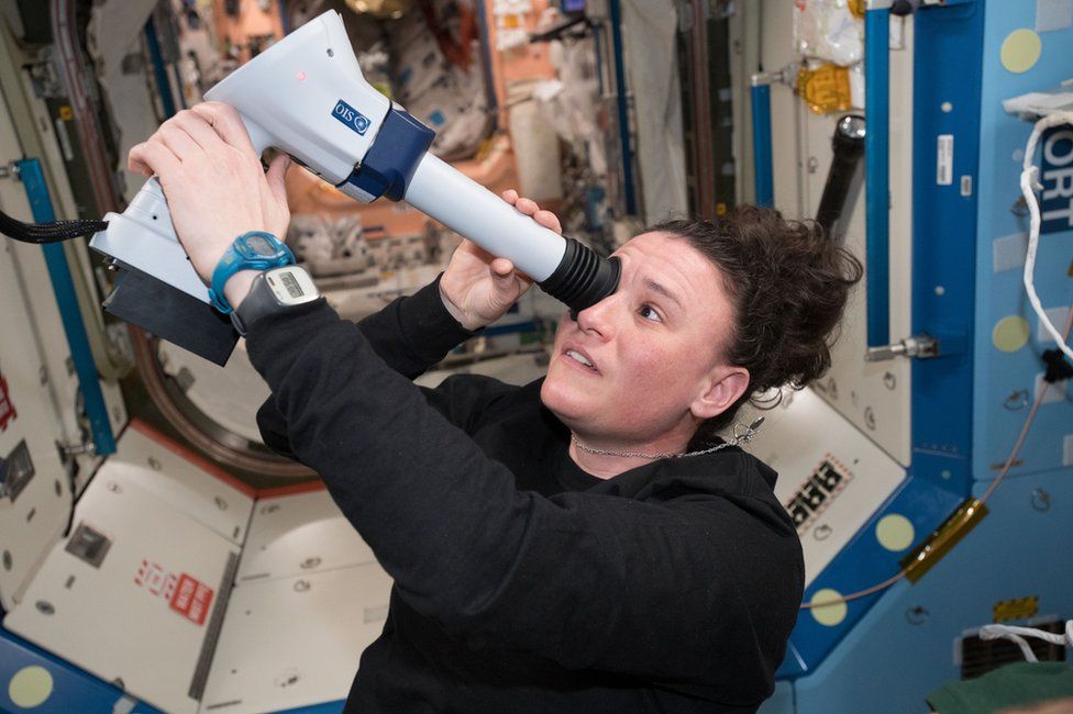 Astronaut Serena Auñón-Chancellor examines her eyes aboard the ISS