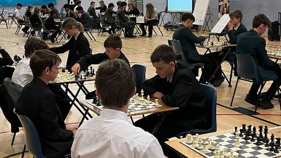 Young players take part in a chess tournament
