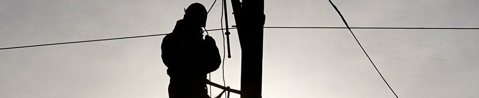 Engineer repairing power lines