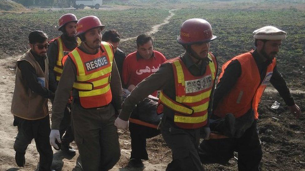rescuers holding a stretcher
