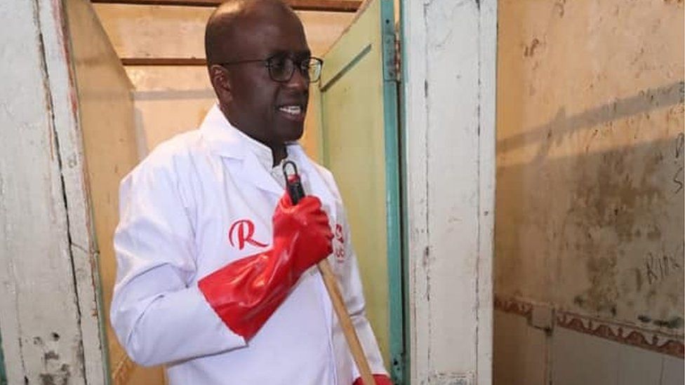 Nairobi gubernatorial candidate Polycarp Igathe cleaning public toilets