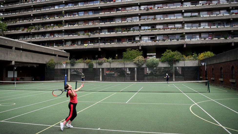 Residents in Barbican, London, playing tennis