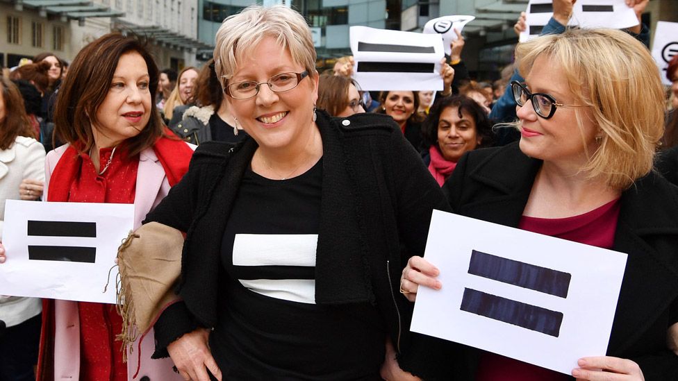 Carrie Gracie (centre) and other BBC employees outside New Broadcasting House in March 2018