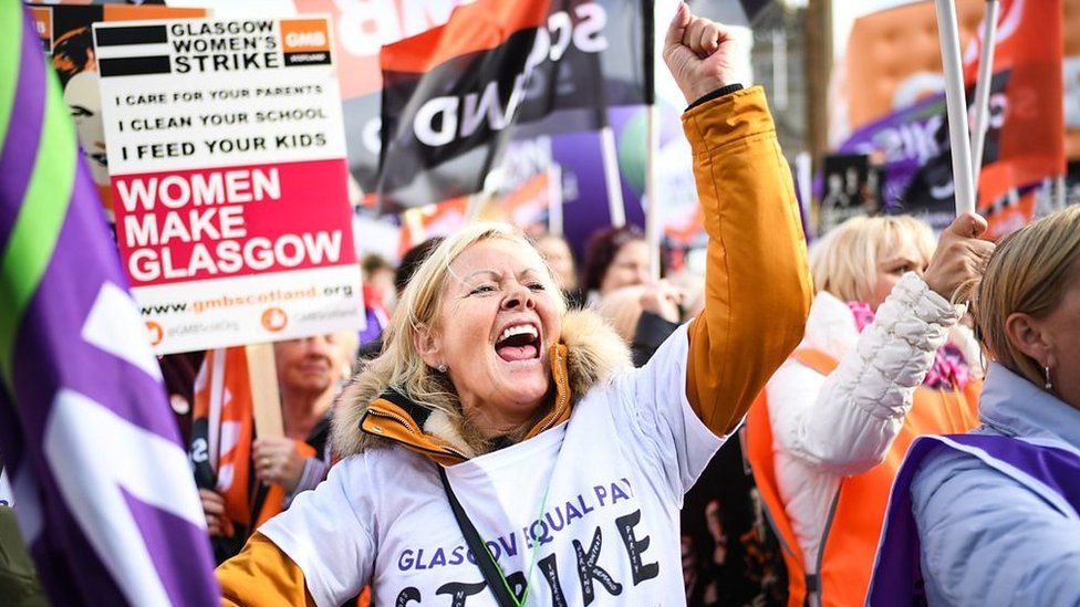 Thousands of women marched in Glasgow in one of the UK's biggest equal pay strikes.