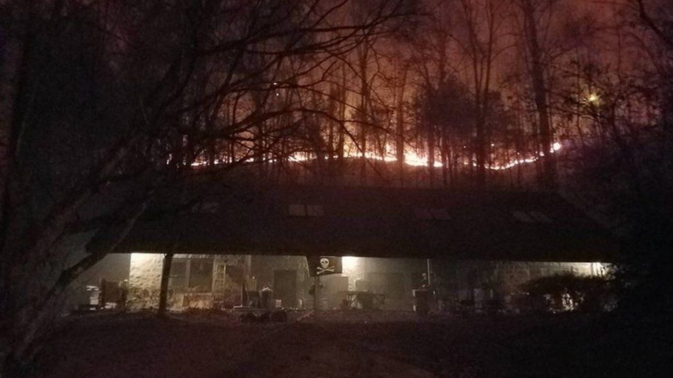 A wildfire approaches the Arrowmont School of Arts and Crafts on Tuesday night