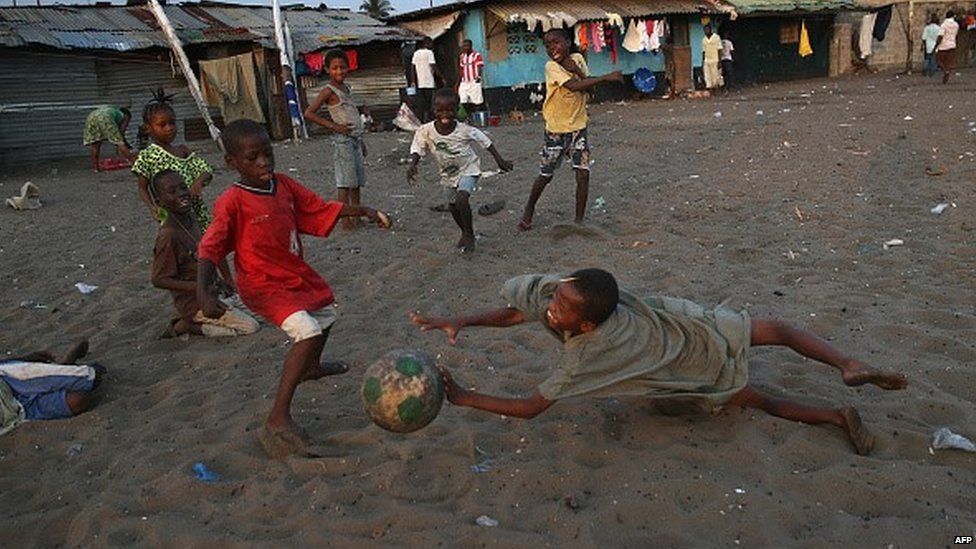 Children play soccer in the West Point township on January 31, 2015 in Monrovia, Liberia.