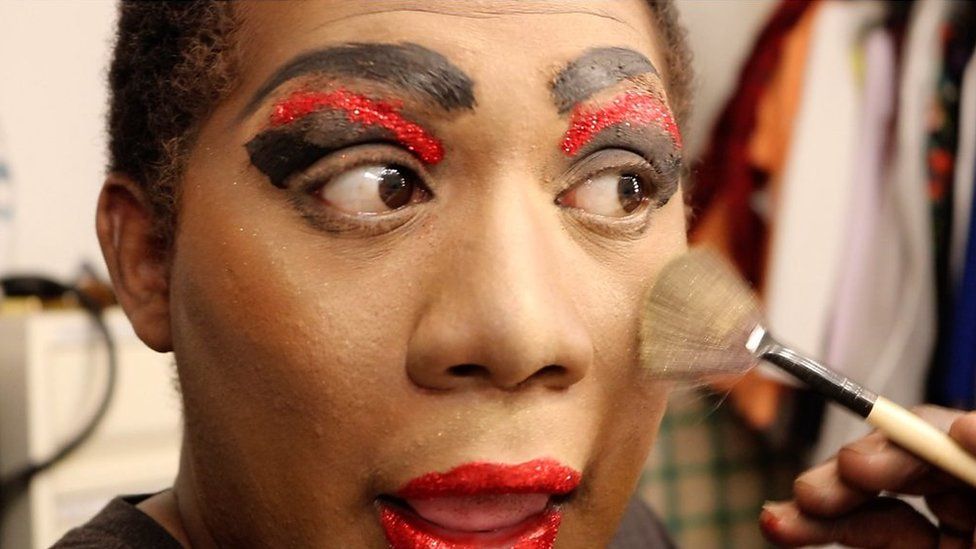 James Bartholomew putting on make-up to become drag act Yshee Black