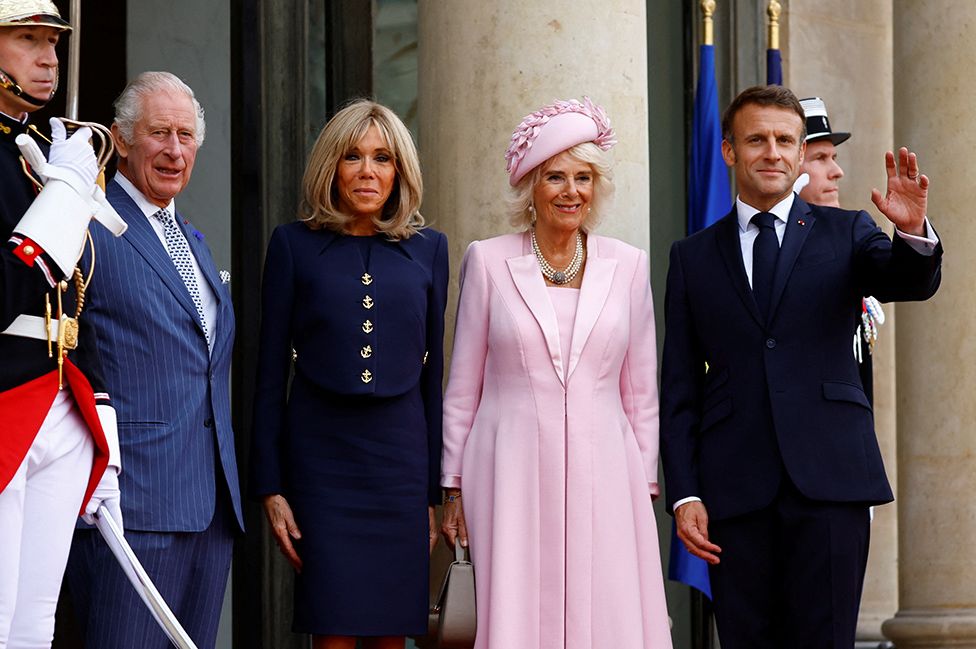French President Emmanuel Macron, his wife Brigitte Macron, King Charles and Queen Camilla pose at the Elysee Palace in Paris