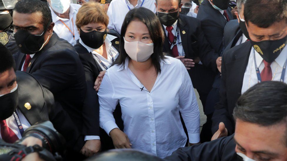 Presidential candidate Keiko Fujimori leaves the polling station after voting