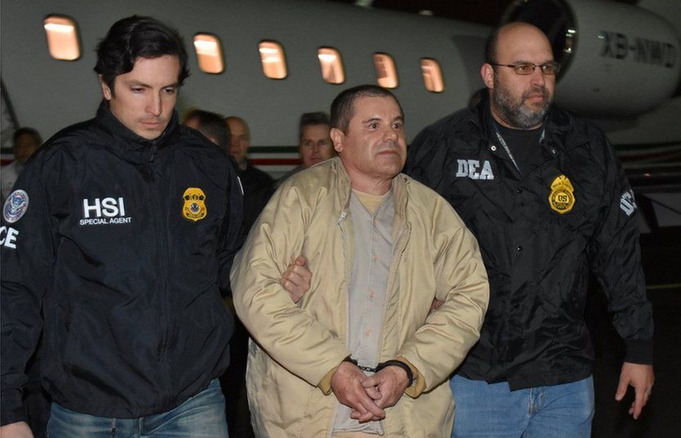 Joaquín Guzmán escorted by police at Long Island MacArthur airport in New York - 19 January