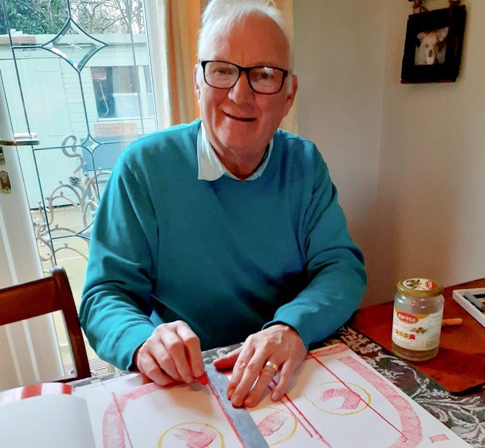 Philip Watmough creating artwork in his home during