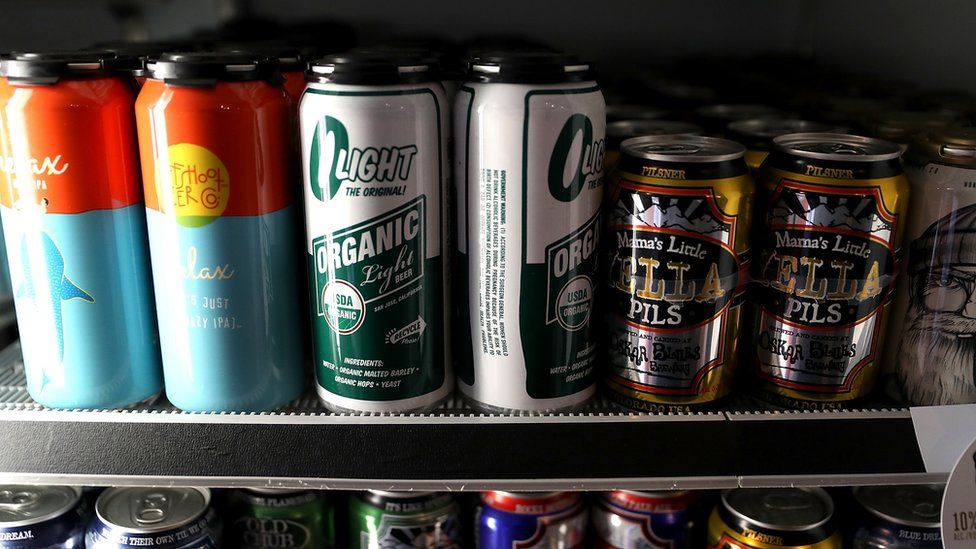 Beer in aluminum cans is displayed on a shelf at Ales Unlimited on March 2, 2018 in San Francisco, California.