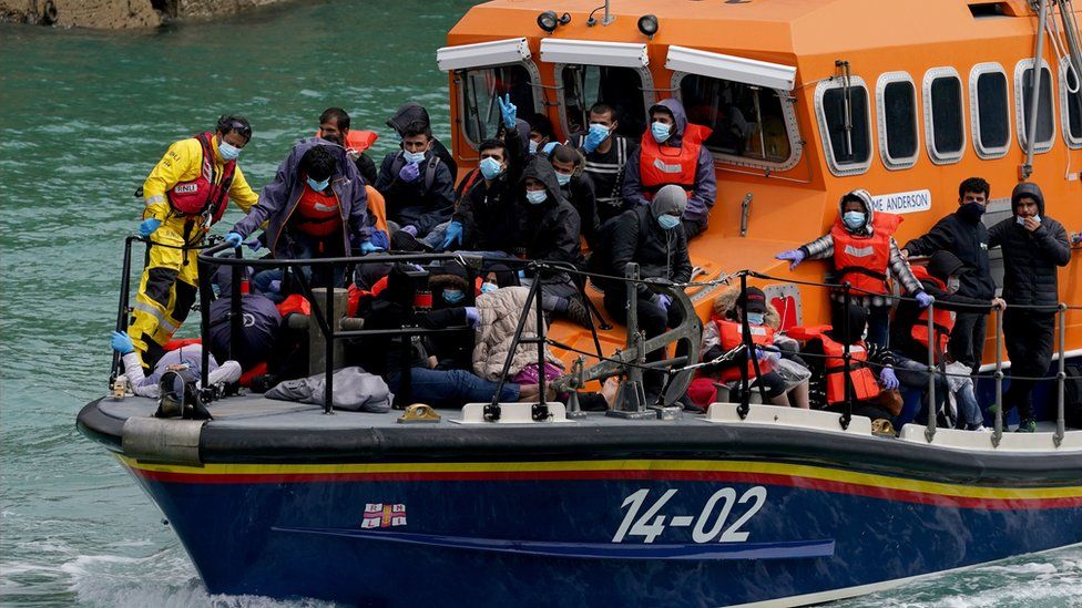 A group of people thought to be migrants are brought in to Dover onboard an RNLI boat following a small boat incident in the Channel