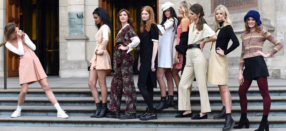 File photo dated 15/11/18 of models posing on the steps of the Victoria and Albert Museum, London, during a photo call for the Mary Quant exhibition