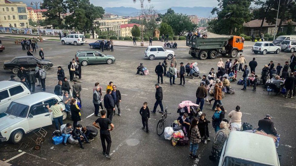 Ethnic Armenians wait to be evacuated from Stepanakert on September 26, 2023.