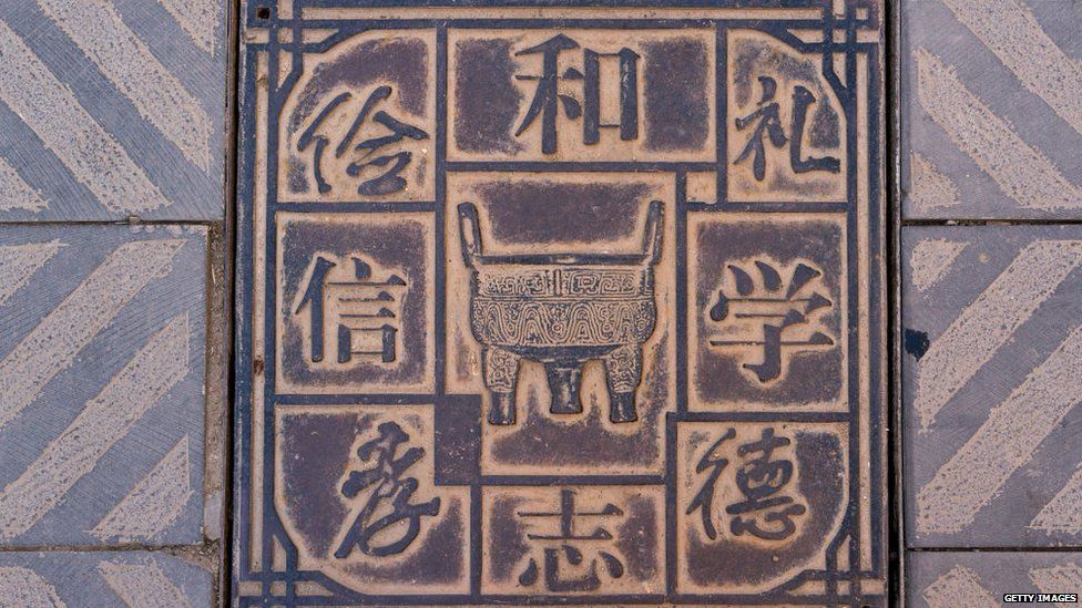Square manhole cover in the street, Gansu province, China
