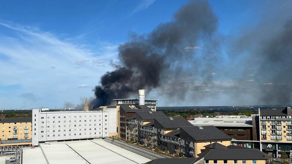 Smoke above buildings during a blaze in Feltham