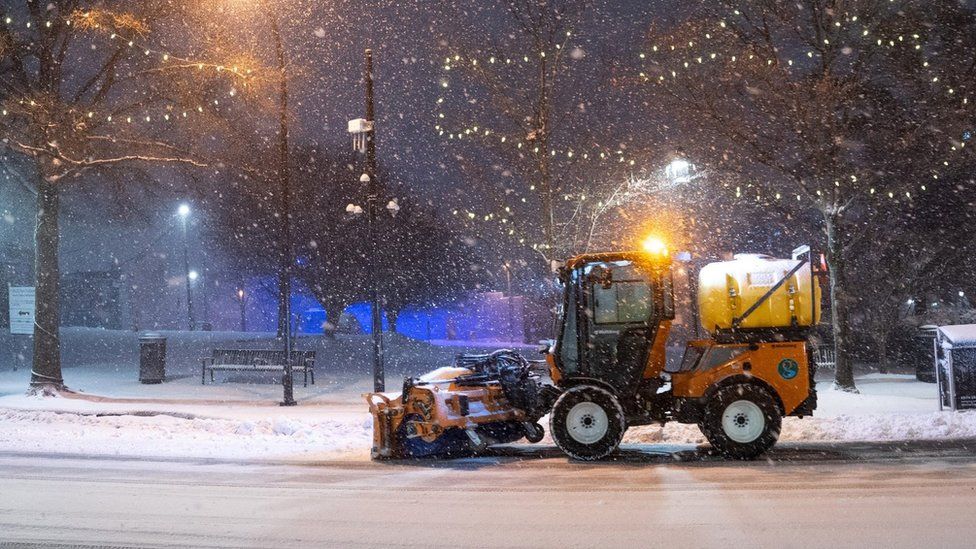 A snow plough clears Main St. on January 16, 2022 in Greenville, South Carolina.