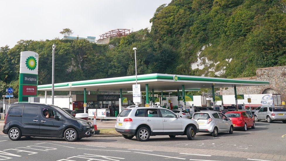 Cars queue at a petrol station in Dover