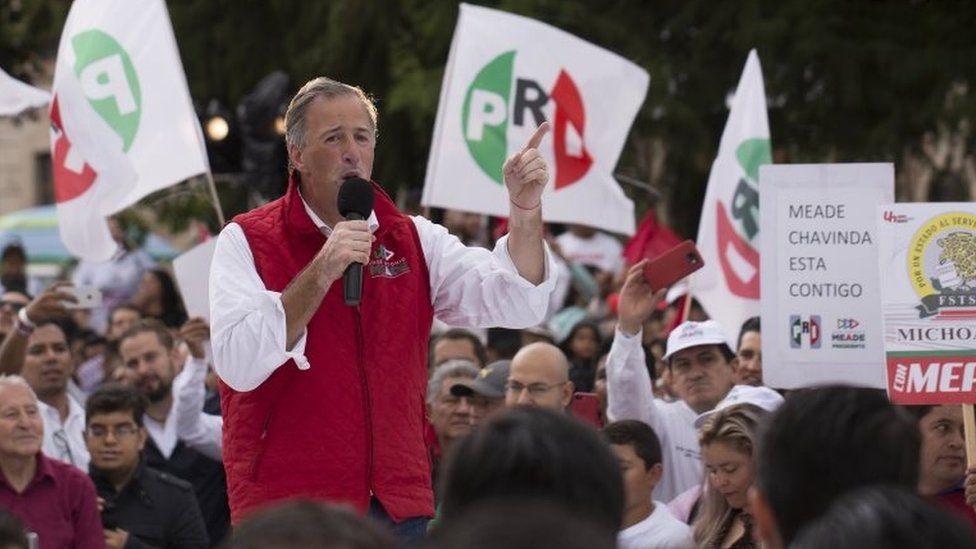 Mexico's presidential candidate for Todos por Mexico -a coalition of the PRI, PVEM and Nueva Alianza parties- Jose Antonio Meade addresses supporters during a campaign rally in Morelia, Michoacan state, Mexico on June 25, 2018
