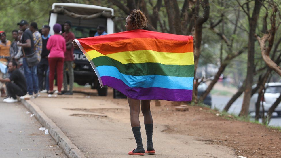 A member of Refugee Flag Kenya, an organisation that protects LGBT refugees and asylum seekers in Kenya poses for a photo during a demonstration outside the United Nations High Commissioner for Refugees (UNHCR), offices in Nairobi, Kenya, 13 May 2019.
