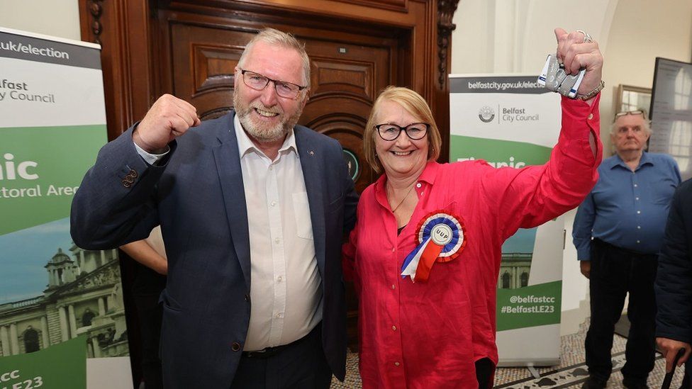 Ulster Unionist Party candidate Sonia Copeland celebrates winning a seat with party leader Doug Beattie during the Northern Ireland council elections at Belfast City Hall.