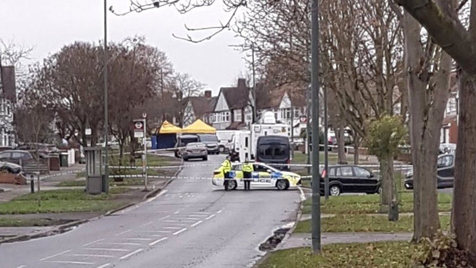 Forensic tents, explosives team vans and a police cordon on Willersley Avenue