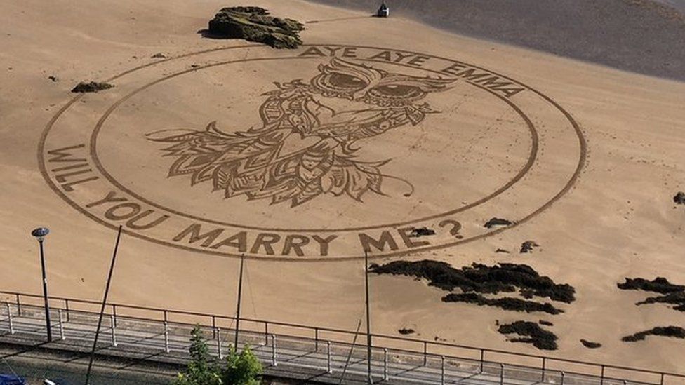 A sand engraving proposal on Tenby beach