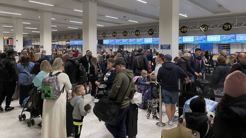 Long queues at check-in at Manchester Airport at Easter