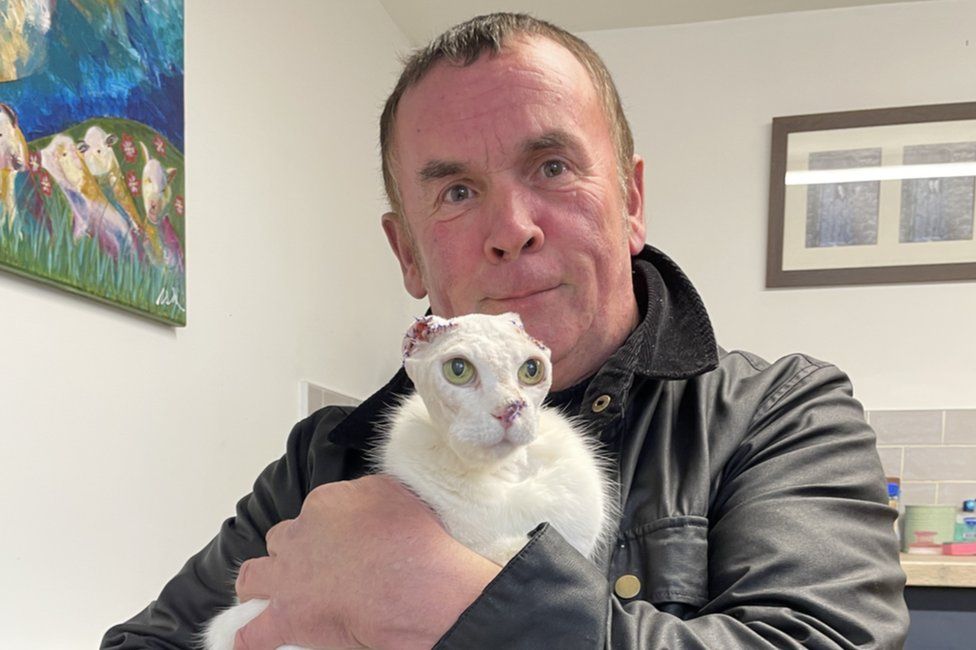 Dave Whitehouse with the cat