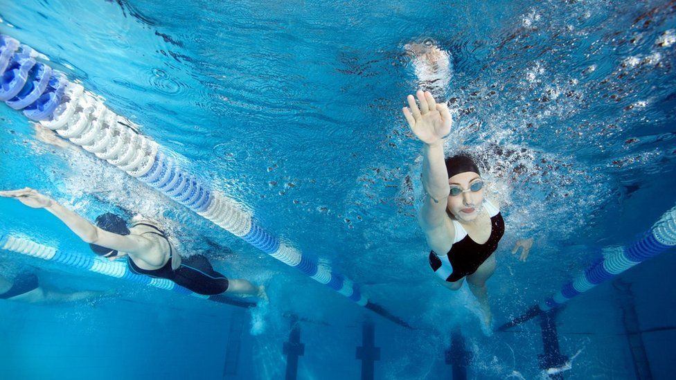 Swimmers in pool