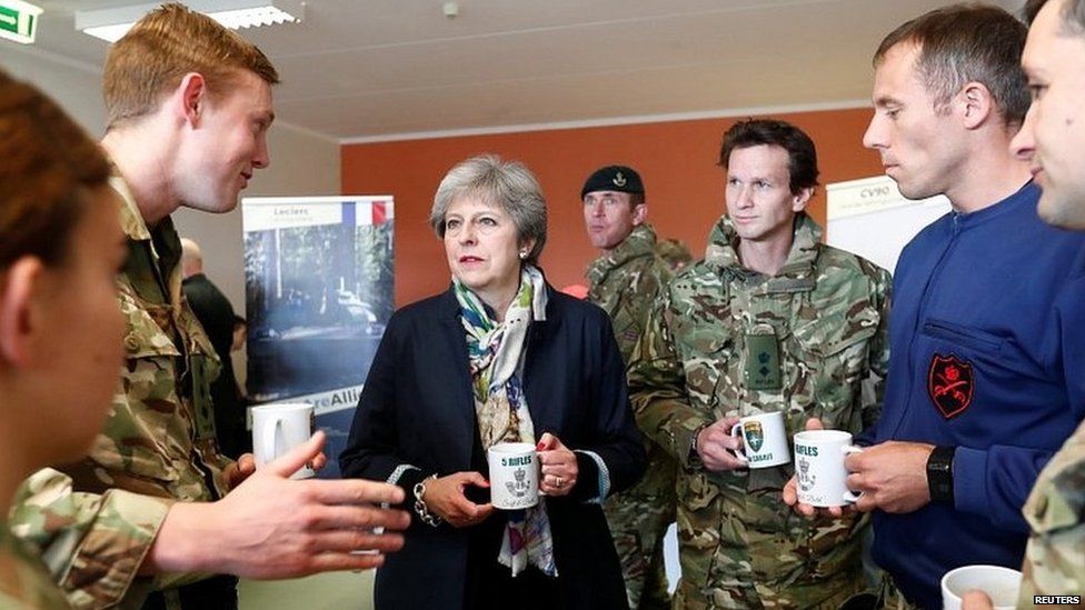 Theresa May meets British troops in Tallinn