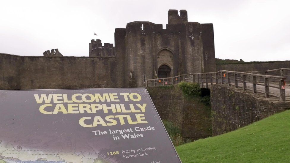Caerphilly Castle and welcome sign