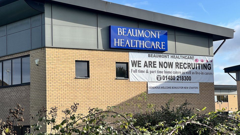 Beaumont Healthcare offices in Eaton Socon. It shows a recruitment banner on the outside.
