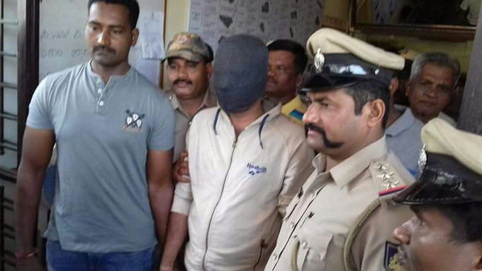 Dr Ameet Gaikwad with police