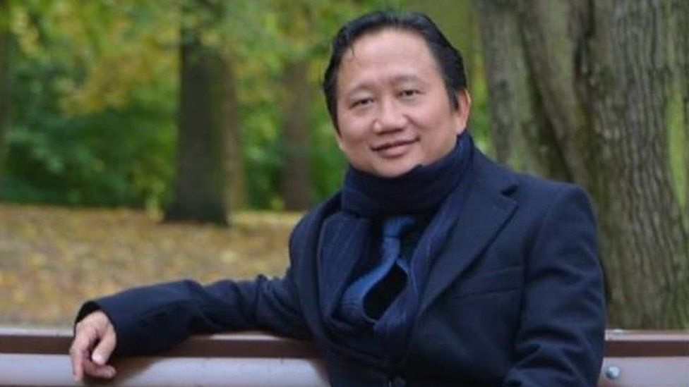 Vietnamese national Trinh Xuan Thanh sitting on a park bench in Berlin