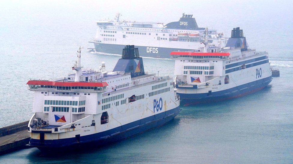 A DFDS ferry passes the P&O Ferries the Pride of Kent (left) and the Pride of Canterbury (right) moored at the Port of Dover