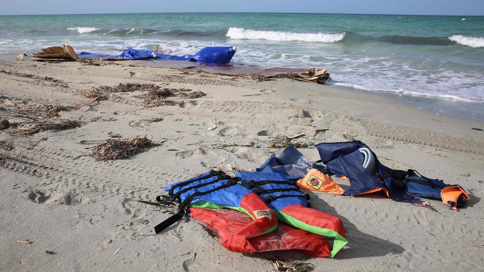 Life jackets washed up on a beach after dozens of migrants drowned in a shipwreck off the Libyan coast of on September 21, 2017
