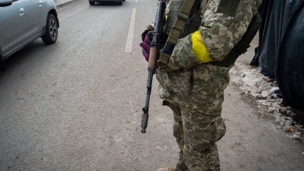 A Ukrainian soldier at a checkpoint