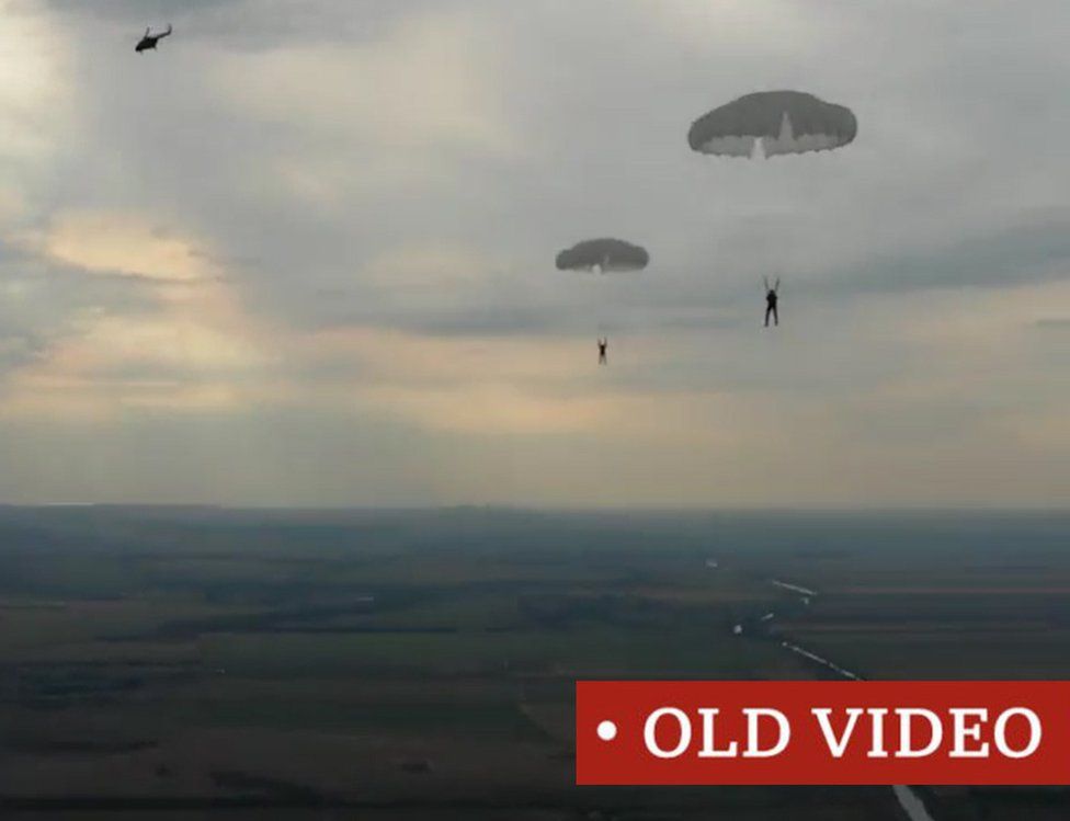 Screen grab of TikTok clip of Russian men parachuting