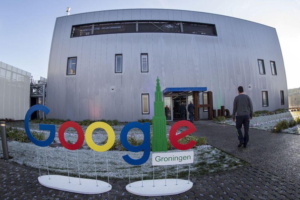 A picture taken on December 6, 2016 shows Google Groningen logo for the office during the opening of the new Google data centre in Eemshaven, near Groningen.