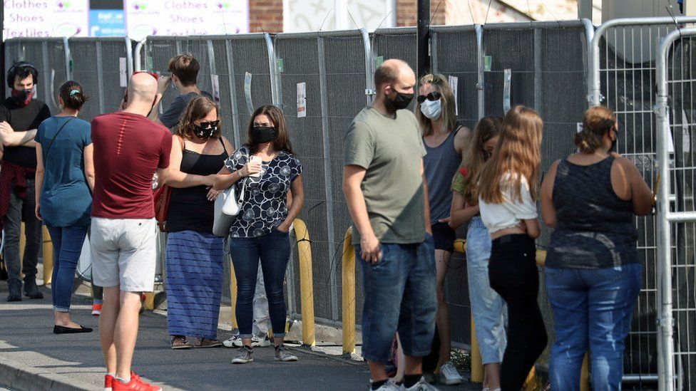 People queue outside a walk-in Coronavirus testing centre in Marlborough Road in Southampton.