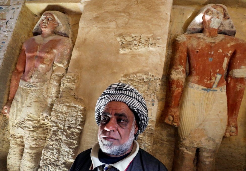 An Egyptian archaeological worker stands inside the newly-discovered tomb of "Wahtye", which dates from the rule of King Neferirkare Kakai, at the Saqqara area near its necropolis, in Giza, Egypt, December 15, 2018.