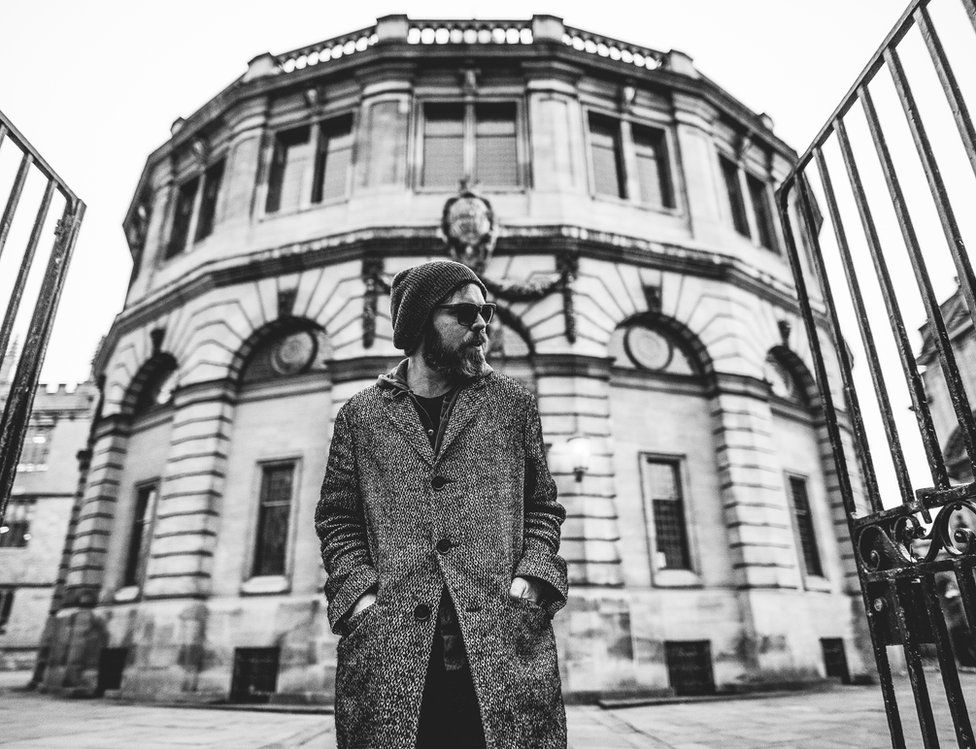 Gaz Coombes in front of the Sheldonian Theatre