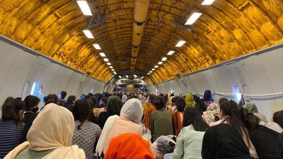 Women sat on an aircraft