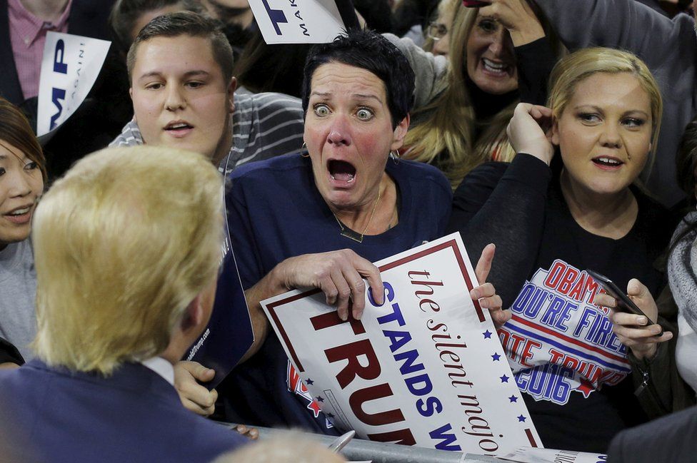 Audience member Robin Roy reacts as US Republican presidential candidate Donald Trump greets her at a campaign rally in Lowell, Massachusetts, 4 January 2016.