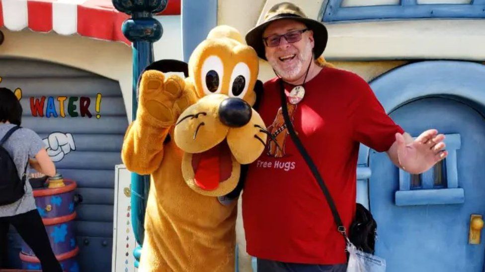 Jeff at Disneyland with Pluto