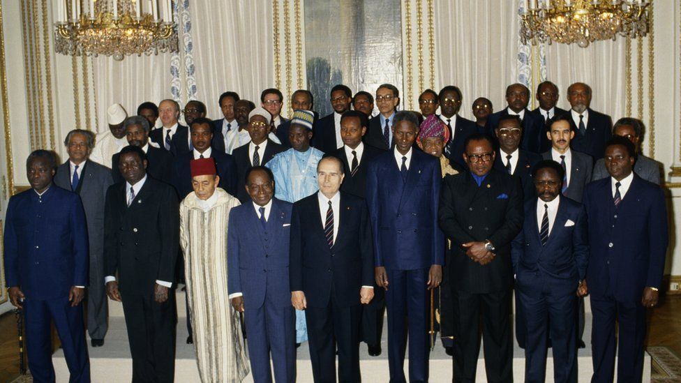 Family picture of African heads of state posing with their French counterpart Francois Mitterand