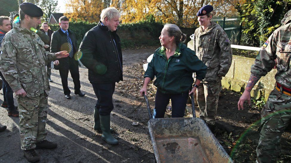 Boris Johnson visiting Stainforth, South Yorkshire, during flooding in November 2019