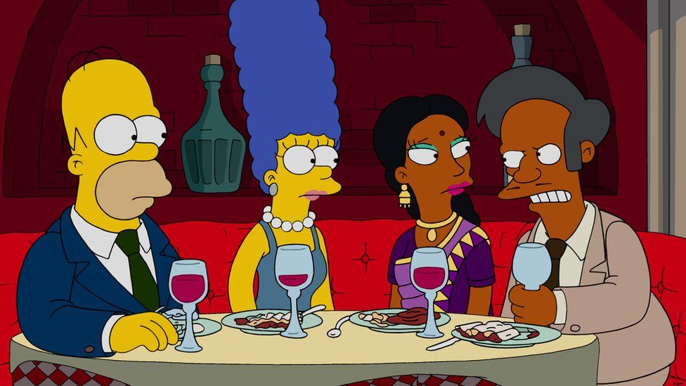 Homer and Marge with Apu and his wife